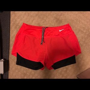 Red/orange running shorts